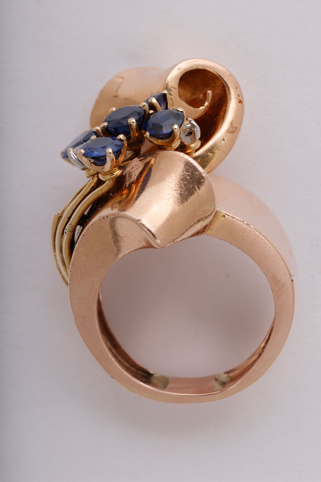 Retro sapphire, diamond, and gold Ribbon Ring