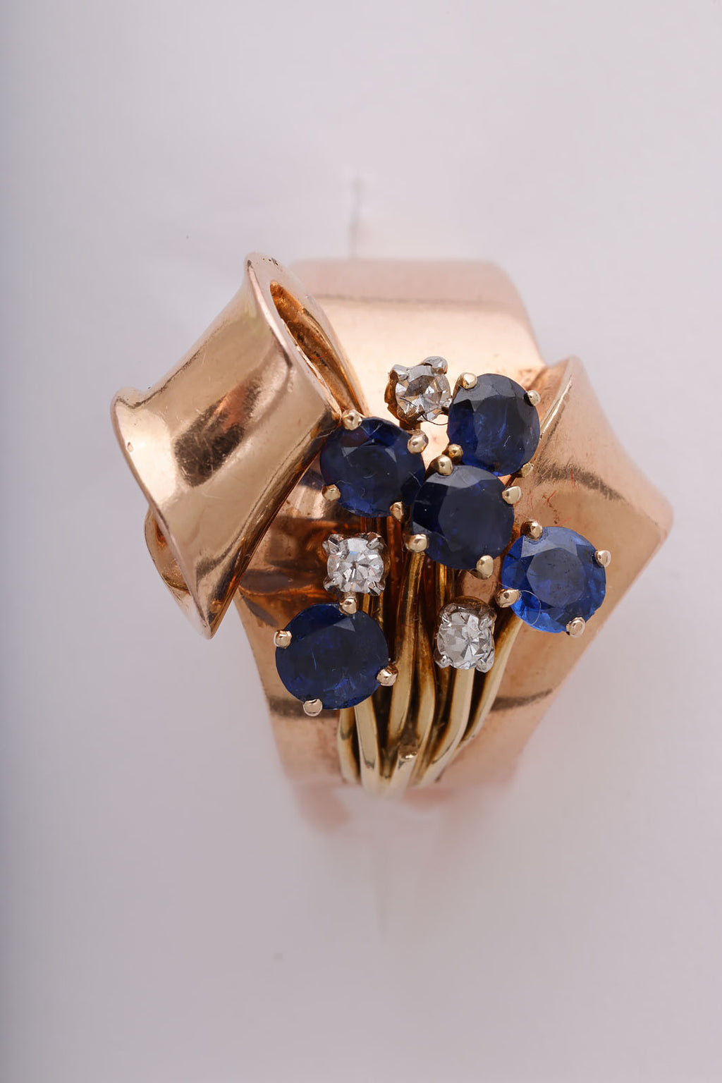 Retro sapphire, diamond, and gold Ribbon Ring