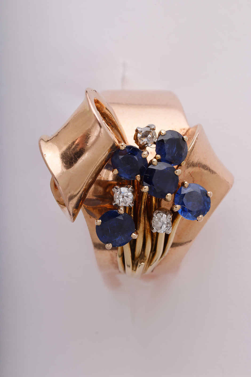 Retro sapphire, diamond, and gold Ribbon Ring